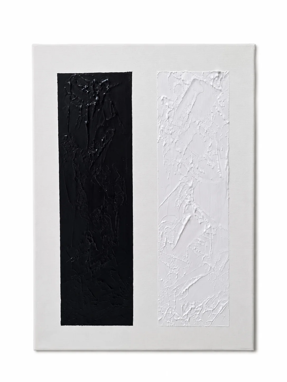 Split — one black vertical band and one white textured vertical band, side by side.